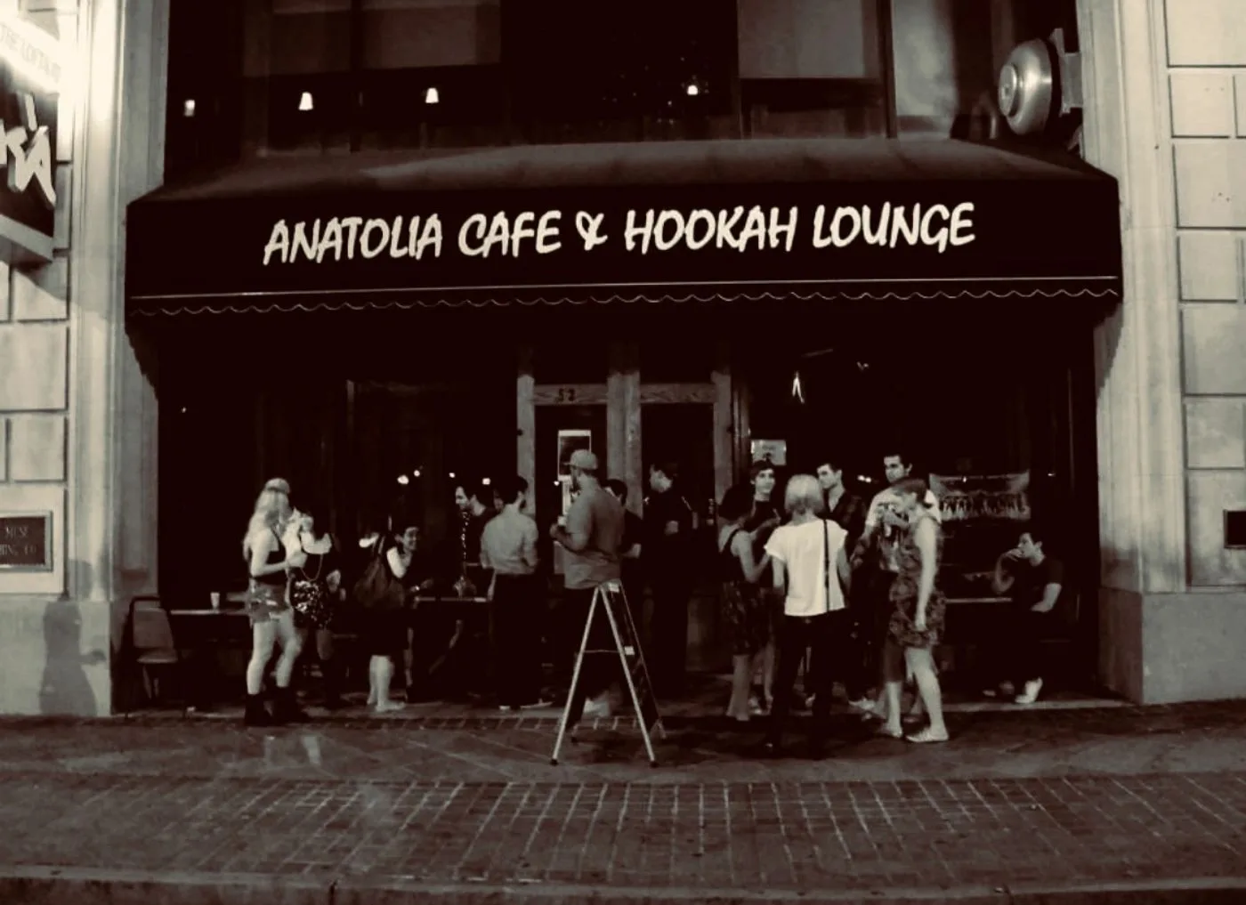 Guests gathering outside Anatolia Cafe on Peachtree Street